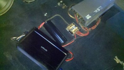Lola - Polk Audio amp, capacitor, fuse block and Lanzar amp.jpg